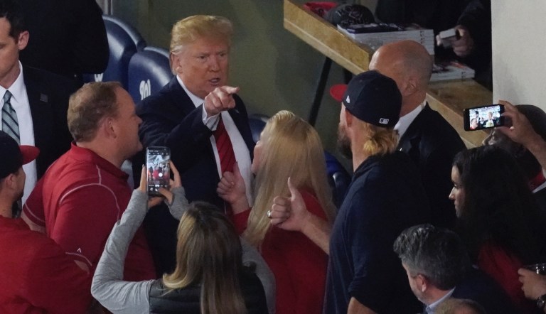 President Donald Trump leaves his suite during the eighth inning of Game 5 of the baseball World Series between the Houston Astros and the Washington Nationals Sunday, Oct. 27, 2019, in Washington.