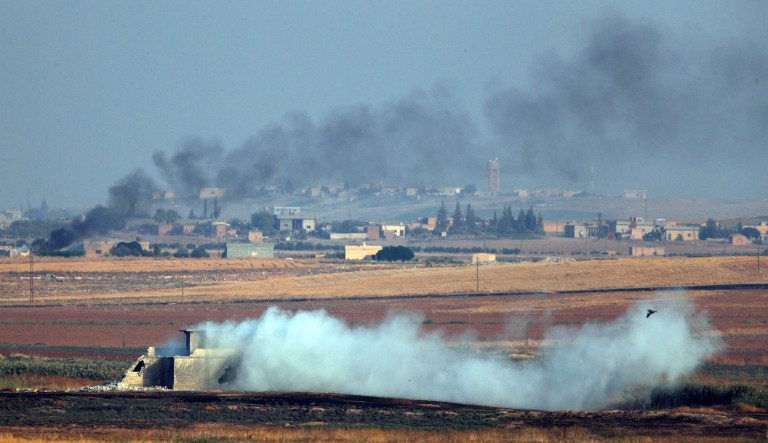 In this photo taken from the Turkish side of the border between Turkey and Syria, in Akcakale, Sanliurfa province, southeastern Turkey, smoke billows from targets inside Syria during bombardment by Turkish forces Wednesday, Oct. 9, 2019.                                                                                                                                                                                                                                                                                                                                         