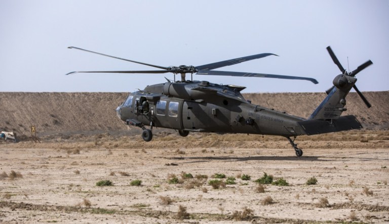 A U.S. Army UH 60 Black Hawk helicopter lands in Camp Taji, Iraq, March 8, 2018. 