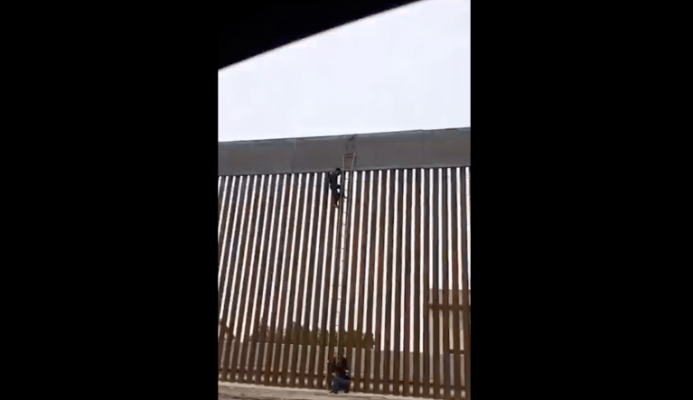 Climbers conquer 'unclimbable' wall