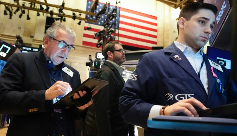 Traders work on the floor at the New York Stock Exchange in New York, Wednesday, May 3, 2023.  Stocks are drifting ahead of what Wall Street hopes will be the last hike to interest rates for a long time. 