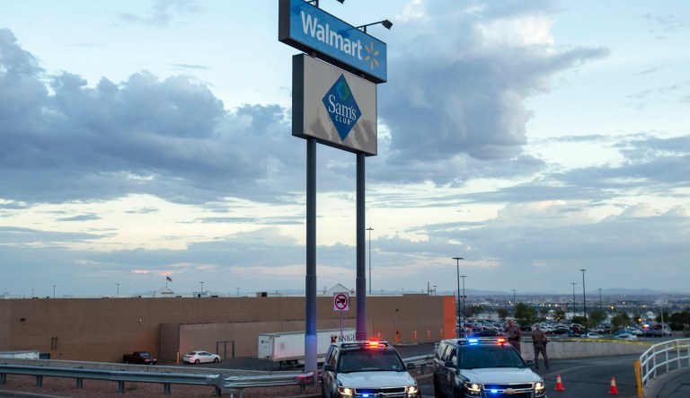 Texas state police cars block the access to the Walmart store in the aftermath of a mass shooting in El Paso, Texas, Saturday, Aug. 3, 2019.
