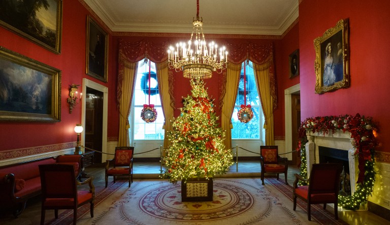 The Red Room, with the theme to celebrate America's Children, is seen during the 2018 Christmas Press Preview at the White House in Washington, Monday, Nov. 26, 2018.  Christmas has arrived at the White House for 2018 as first lady Melania Trump unveiled the holiday decor. She designed the decor, which features a theme of "American Treasures."