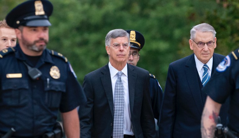 The top U.S. diplomat in Ukraine, William Taylor, is escorted by U.S. Capitol Police as he arrives to testify before House committees as part of the Democrats' impeachment investigation of President Donald Trump, at the Capitol in Washington, Tuesday, Oct. 22, 2019. Taylor expressed unease about the president's motives in delaying U.S. security assistance for Ukraine as Trump was pursuing help with his political campaign from Ukraine's president.
