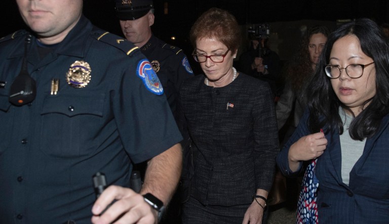 Former U.S. ambassador to Ukraine Marie Yovanovitch, center, leaves Capitol Hill, Friday, Oct. 11, 2019, in Washington, after testifing before congressional lawmakers. 