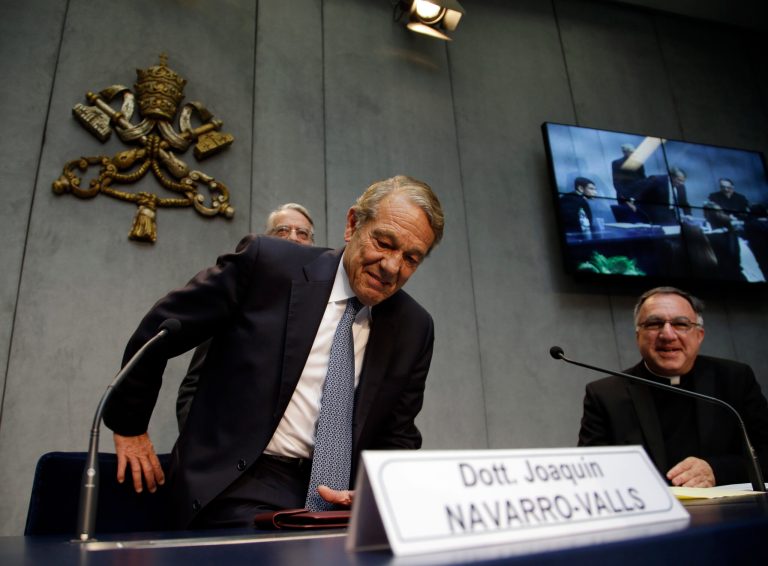 Former Pope John Paul II spokesperson Joaquin Navarro-Valls arrives at a press conference at the Vatican, Friday, April 25, 2014. Hundred thousands of pilgrims and faithful are expected to reach Rome to attend the scheduled April 27 ceremony at the Vatican in which Pope Francis will elevate in a solemn ceremony John XXIII and John Paul II to sainthood. (AP Photo/Gregorio Borgia)