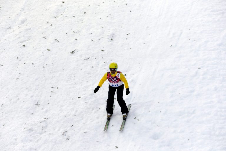 Brazil's Joselane Santos lands from a jump during the women's freestyle skiing aerials qualifying at the Rosa Khutor Extreme Park, at the 2014 Winter Olympics, Friday, Feb. 14, 2014, in Krasnaya Polyana, Russia. (AP Photo/Andy Wong)