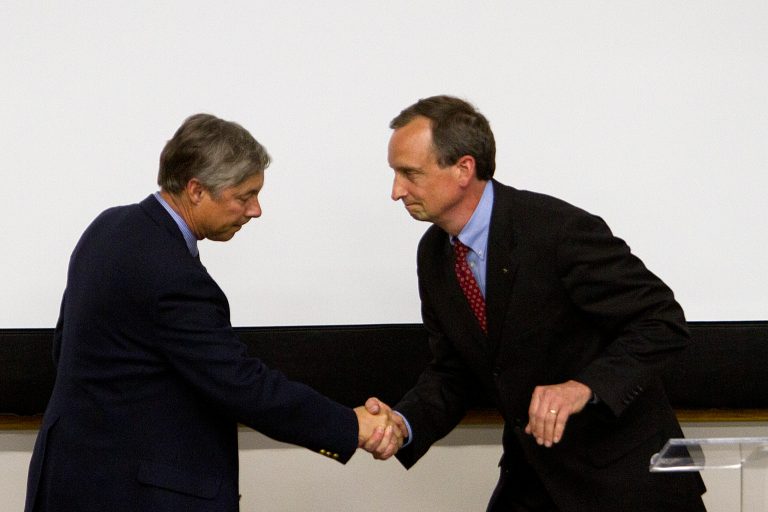   In this photo taken Sunday, June 10, 2012, Rep. Fred Upton, left, R-Mich., and Jack Hoogendyk shake hands after their debate at Western Michigan University in Kalamazoo, Mich. Upton and Hoogendyk, his Republican primary challenger are arguing over who's the biggest deficit hawk. (AP Photo/The Kalamazoo Gazette, Josh Mauser)  