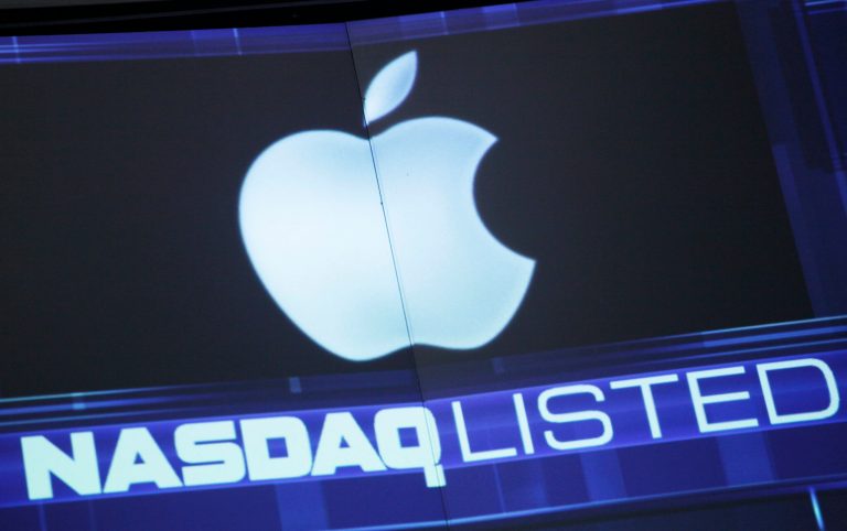   FILE - In this Tuesday, Aug. 21, 2012, file photo, the Apple logo is shown on a stock ticker at the Nasdaq MarketSite, in New York. Apple is entering the home stretch of what will likely be its best holiday season yet as shoppers snap up iPhones and iPads in record numbers in December 2012. Yet the world's most valuable company has lost its luster among investors, causing Apple's stock price to plunge by more than 20 percent from a peak reached less than three months ago when the latest iPhone went on sale. (AP Photo/Mark Lennihan)  