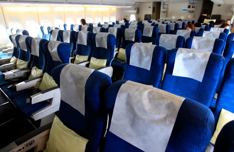 The immigration agency spent nearly $12 million on flights that were less than 40 percent full. (AP Photo)