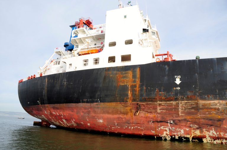 File - In this Jan. 7, 2013 file photo provided by the Coast Guard, damage is seen to the tanker Overseas Reymar following a collision with tower six of the San Francisco-Oakland Bay Bridge. A state panel is recommending that the pilot of the empty oil tanker that sideswiped the bridge have his license suspended or revoked. The recommendation is contained in a report released Thursday April 4, 2013 by the California Board of Pilot Commissioners Incident Review Committee.(AP Photo/U.S. Coast Guard, Petty Officer 2nd Class Pamela J. Boehland, File)