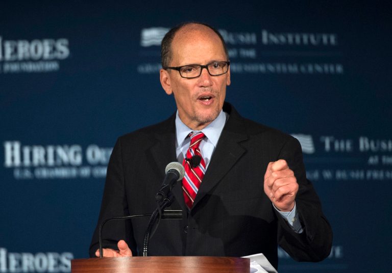 Tom Perez met with two members of unions, Unite Here and the Service Employees International Union, in Las Vegas on Dec. 7. (AP Photo)