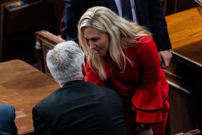 Rep.-elect Marjorie Taylor Greene of Georgia speaks with Republican Leader Kevin McCarthy on the House floor Wednesday, Jan. 4, 2023, at the U.S. Capitol in Washington DC. The House reconvened after failing to elect a speaker Tuesday on three straight ballots.