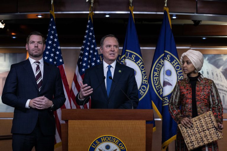 Rep. Eric Swalwell, D-Calif., Rep. Adam Schiff, D-Calif., and Rep. Ilhan Omar, D-Minn., speak during a news conference on Capitol Hill in Washington, Wednesday, Jan. 25, 2023.