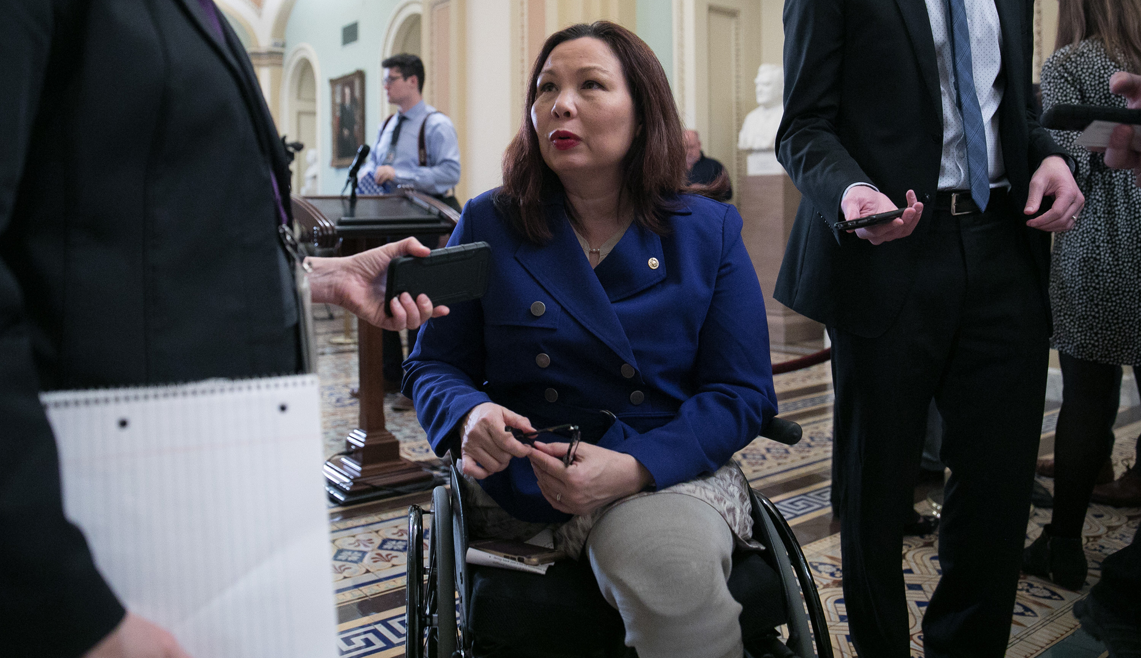 Senator Tammy Duckworth, D-IL, takes questions from reporters, following a news conference on Capitol Hill, Tuesday, January 29, 2019.