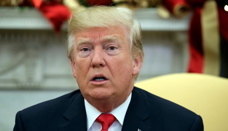 President Trump refuses to answer questions on rumors of a White House plan to replace Secretary of State Rex Tillerson. (AP Photo/Evan Vucci)