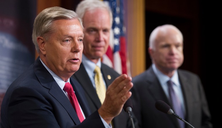 From left, Sen. Lindsey Graham, R-S.C., Sen. Ron Johnson, R-Wis., and Sen. John McCain, R-Ariz., speak to reporters on Capitol Hill as the Republican-controlled Senate failed to fulfill their political promise to repeal and replace 