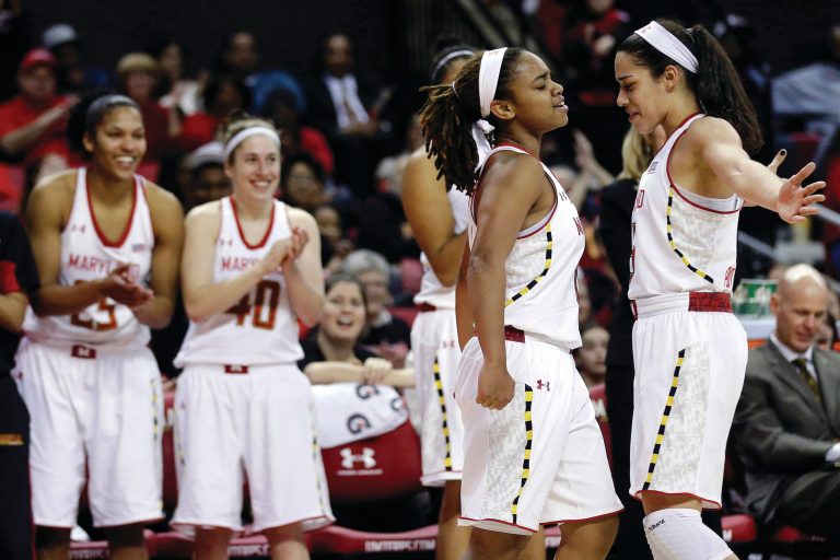 Patrick Semansky/AP
Guards Chloe Pavlech, right, Sequoia Austin and Maryland broke their losing streak Sunday, beating Wake Forest.