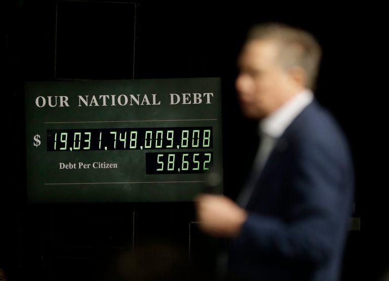 With Washington's addiction to spending, the national debt will be even higher by the time you finish this article. (AP Photo/Mark Humphrey)