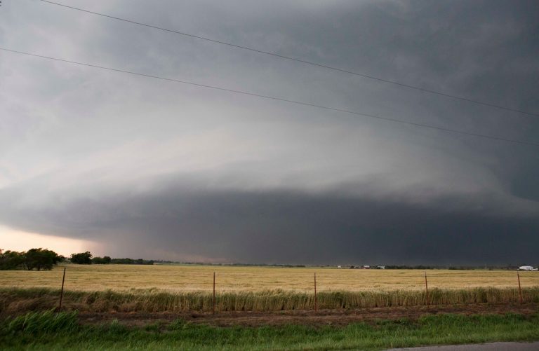 FILE - In this May 31, 2013 file photo a tornado forms near Banner Road and Praire Circle in El Reno, Okla. The National Weather Service says the deadly tornado that struck near Oklahoma City late last week was another top-of-the-scale EF5 that packed winds reaching 295 mph. The weather service also says the twister's 2.6-mile width is the widest ever recorded. (AP Photo/Alonzo Adams, File)