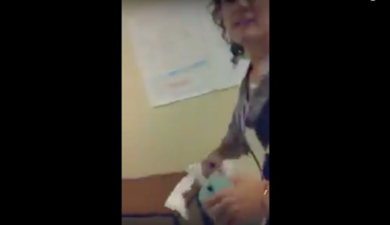 She quickly realized that she had been caught destroying property, and became so frustrated that she began cursing and physically assaulted my friend in an attempt to remove the phone from his hands. (Photo courtesy: Young Americans for Freedom chapter at the University of Florida/Kevin Aponte Lemos)