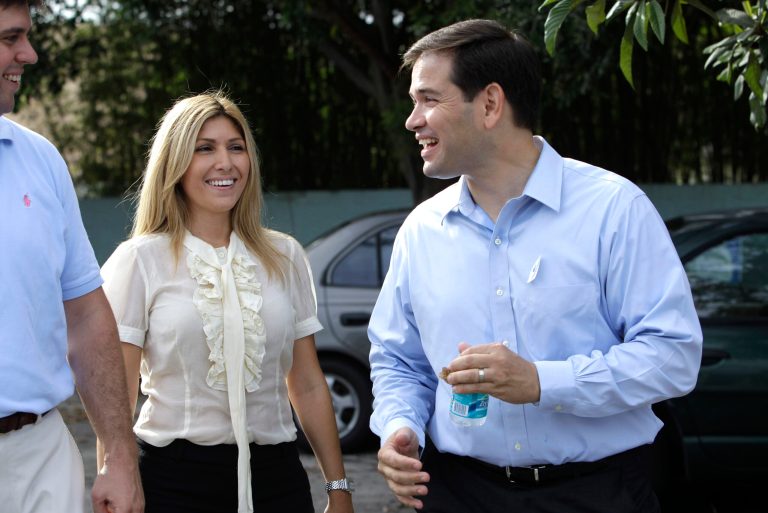 Marco Rubio, right, talks with his wife Jeanette, left, after voting in Florida's primary election in West Miami, Florida Tuesday, Aug. 24, 2010. (AP Photo/Lynne Sladky)