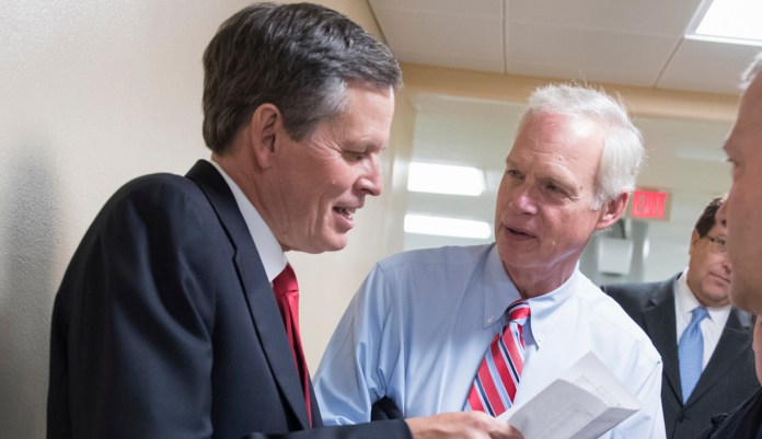 Sen. Steve Daines, R-Mont., and Sen. Ron Johnson, R-Wis., have said they are "nos" on the GOP tax reform bill as written, because it doesn't provide tax breaks large enough to small businesses. (AP Photo/J. Scott Applewhite)