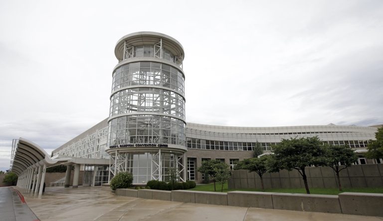 The Salt Palace Convention Center is shown  Saturday, Sept. 27, 2014, in Salt Lake City. More than half a dozen firms are interested in building a large convention hotel in the heart of Salt Lake City, a project that comes with $75 million in possible tax credits. (AP Photo/Rick Bowmer)
