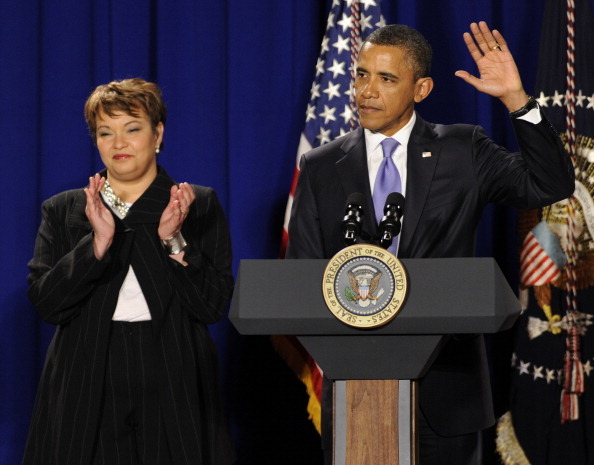 WASHINGTON, DC - JANUARY 10:  (AFP OUT) U.S. President Barack Obama waves after delivering thank you remarks to Environmental Protection Agency employees as EPA Administrator Lisa Jackson applauds, January 10, 2012 in Washington, DC. In Obama's first visit to the EPA he defended their work saying it performs a vital role protecting the environment and furthering energy independance.  (Photo by Mike Theiler-Pool/Getty Images)