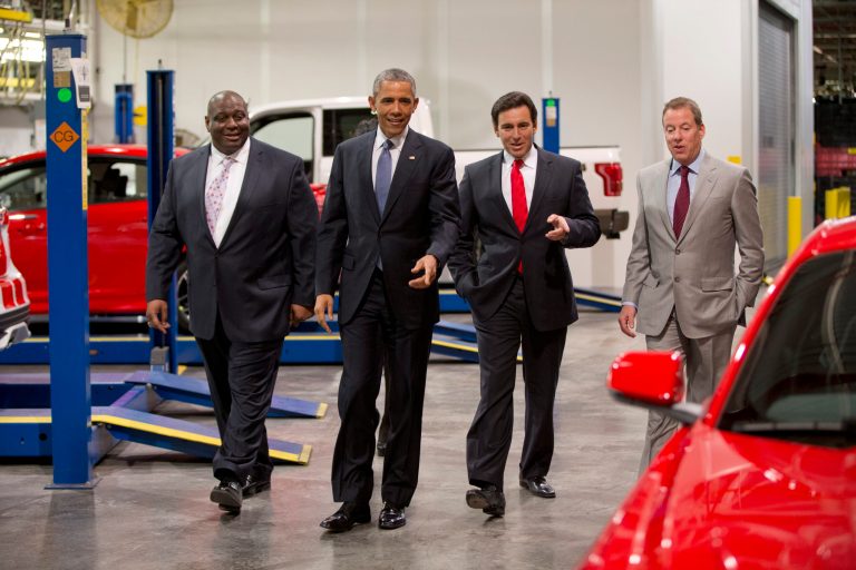 From left, Ford plans manager, Phillip Calhoun, President Obama, Ford President and CEO Mark Fields and Bill Ford eye a new Mustang at Ford Michigan Assembly Plant on Wednesday in Wayne, Mich. (AP/Carolyn Kaster)
