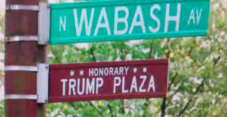 City workers in Chicago took down honorary street signs on Sunday that had been installed around the Trump International Hotel and Tower overlooking the Chicago River. (Photo courtesy of Twitter)