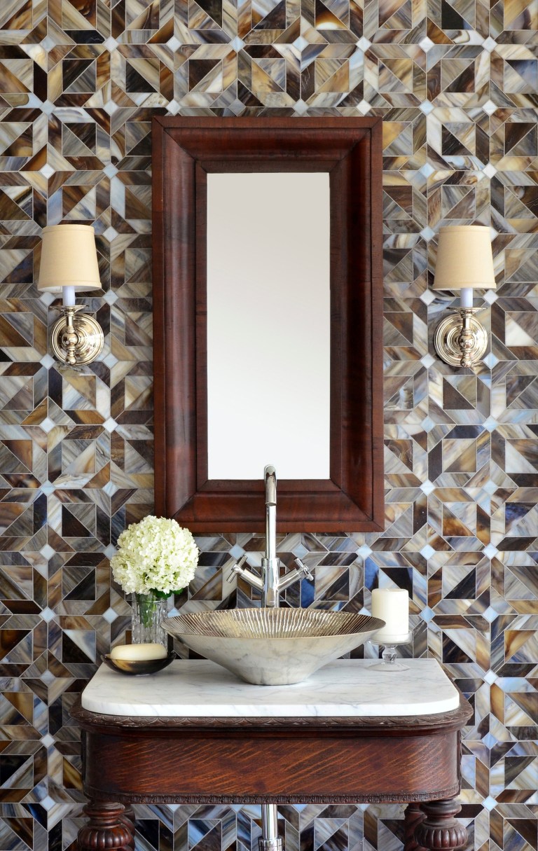 Rubrik, a jewel glass waterjet mosaic shown in Pearl, Schist, and Lavastone, is part of the Parquet Line by Sara Baldwin for New Ravenna Mosaics.