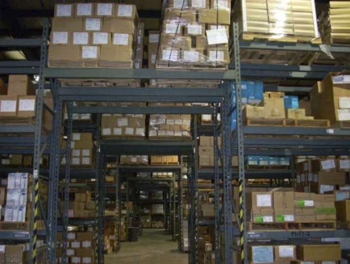 Rows of boxed publications are stored in an Environmental Protection Agency warehouse operated by a contractor in Blue Ash, Ohio. (EPA OIG photo)