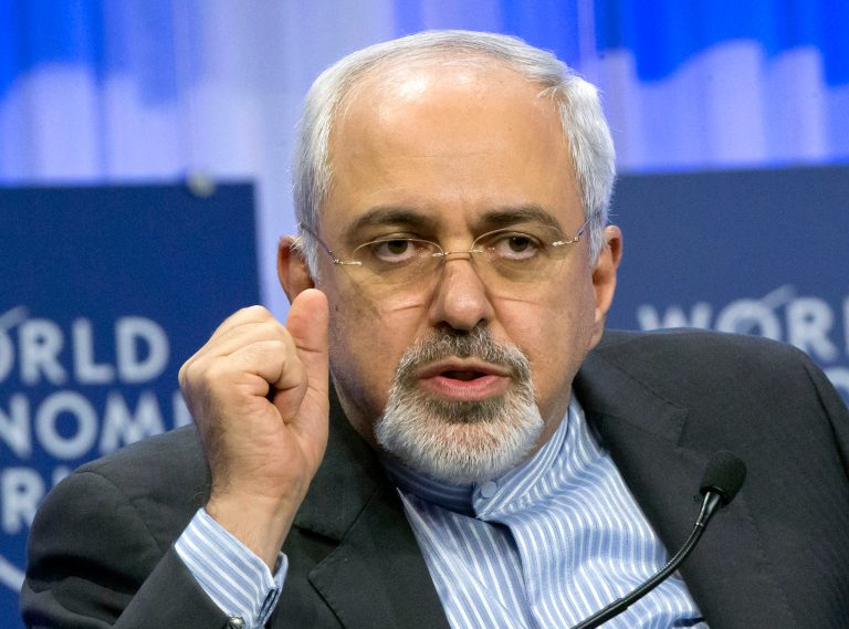 Iraqi Foreign Minister Javad Zarif, gestures as he speaks during a session at the World Economic Forum in Davos, Switzerland, Friday, Jan. 24, 2014.  Iran's foreign minister is calling for all 