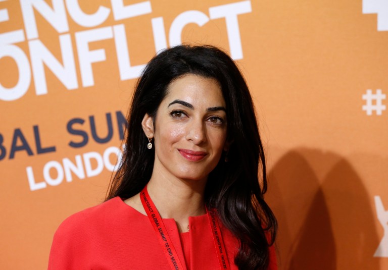 FILE - The June 12, 2014 file photo shows Amal Alamuddin, human rights lawyer and fiancee of US actor George Clooney, as she attends the 'End Sexual Violence in Conflict' summit in London. Alamuddin has been chosen for the U.N.'s three-member commission of inquiry looking into possible violations of the rules of war in Gaza, United Nations Human Rights Council said Monday, Aug. 11, 2014.  (AP Photo/Lefteris Pitarakis, file)
