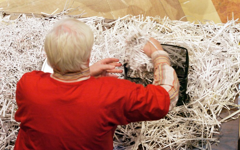 The federal rule requiring the mailing of the prospectus is absurd and wasteful. (AP Photo/Tom Olmscheid)