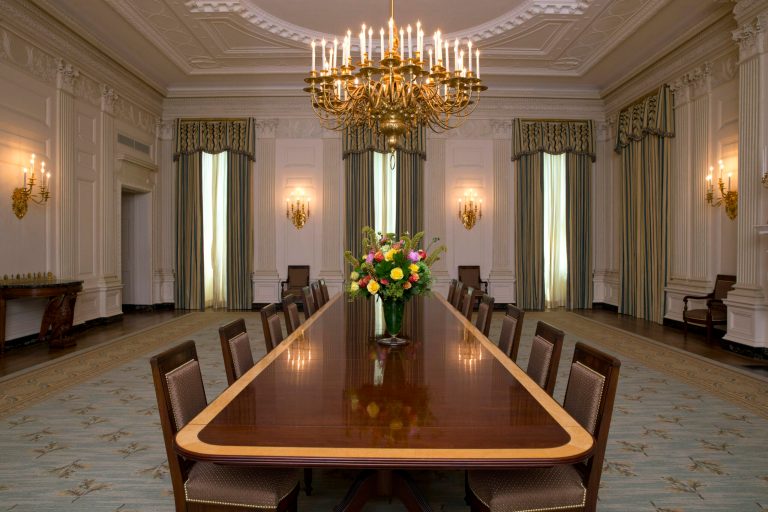 The State Dining room of the White House has been refurbished with new arm chairs, side chairs, and draperies suspended from carved and gilded poles, all of which were selected with the approval of the Committee for the Preservation of the White House in consultation with first lady Michelle Obama, as seen at the White House Tuesday, July 7, 2015 in Washington. (AP Photo/Jacquelyn Martin)