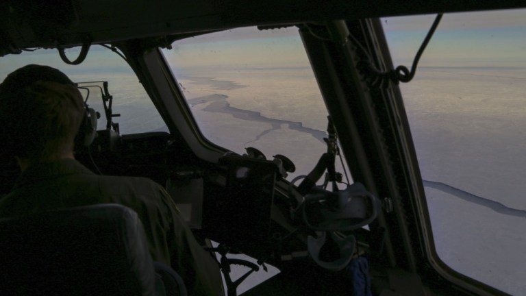 Alaska Air National Guardsmen with the 249th Airlift Squadron prepare to leave Joint Base Elmendorf-Richardson via C-17 Globemaster III transport aircraft on a training air drop mission to the Beaufort Sea several hundred miles north of the Alaskan coastline March 2, 2018.