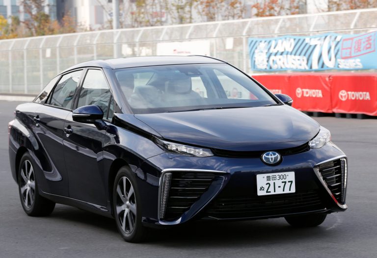 In this photo taken Monday, Nov. 17, 2014, a Toyota Motor Corp.'s new fuel cell vehicle Mirai drives at its showroom test course in Tokyo. (AP Photo)Â 