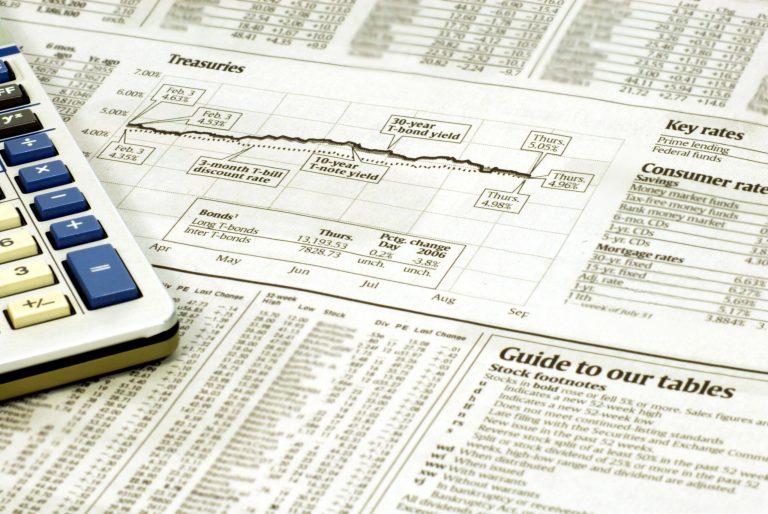 Treasuries ended a three-day advance amid speculation a U.S. budget agreement will support the economy and make it easier for the Federal Reserve to start reducing bond purchases.