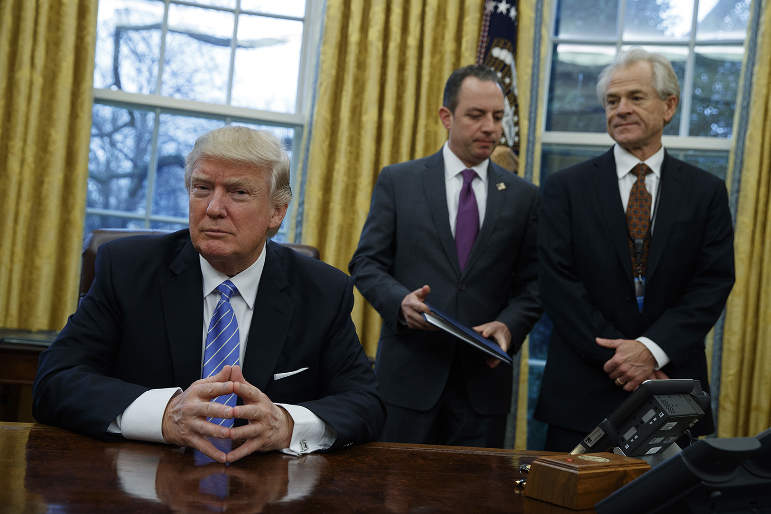 Trump directs top economic advisers to look at re-entering TPP