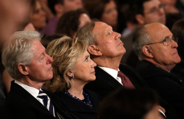 From left, Former U.S. President Bill Clinton sits with his wife former U.S. Secretary of State Hillary Clinton, former New York Governor George Pataki and former New York City Mayor Rudolph Giuliani during the dedication ceremony at the National September 11 Memorial Museum in New York, Thursday,  May 15, 2014.  (AP Photo/Mike Segar, Pool)
