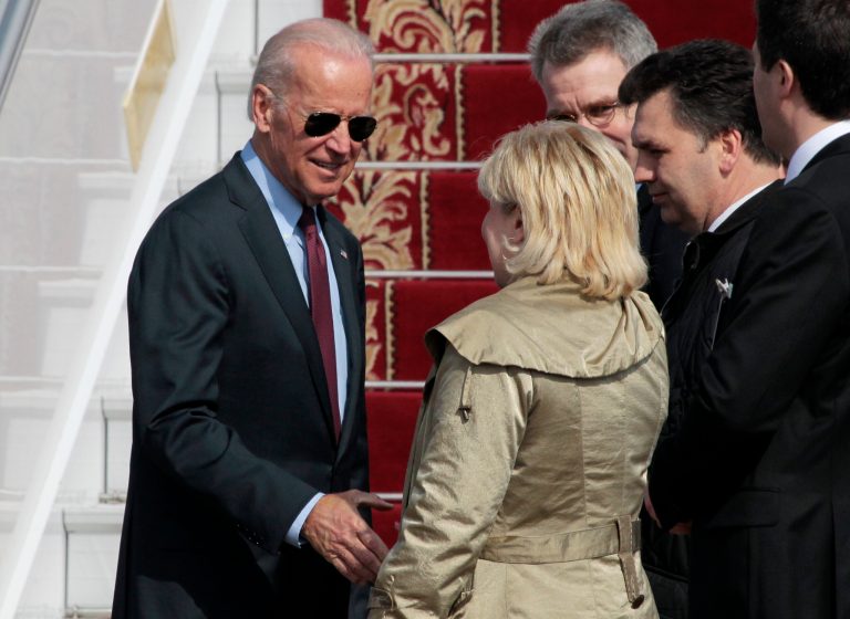 U.S. Vice President Joe Biden , left, is greeted upon arrival at Borispol airport outside Kiev, Ukraine, Monday April 21, 2014. U.S. Vice President Joe Biden will meet with Ukraine's acting president, Oleksander Turchinov, and Prime Minister Arseny Yatseniuk on Tuesday, during a visit to Kiev.  (AP Photo/Sergei Chuzavkov)