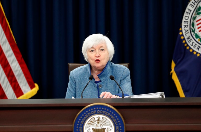 Federal Reserve Board Chairwoman Janet Yellen speaks about the Federal Reserve's monetary policy. The Federal Reserve is raising a key interest rate for the first time in a year. (AP Photo/Alex Brandon)