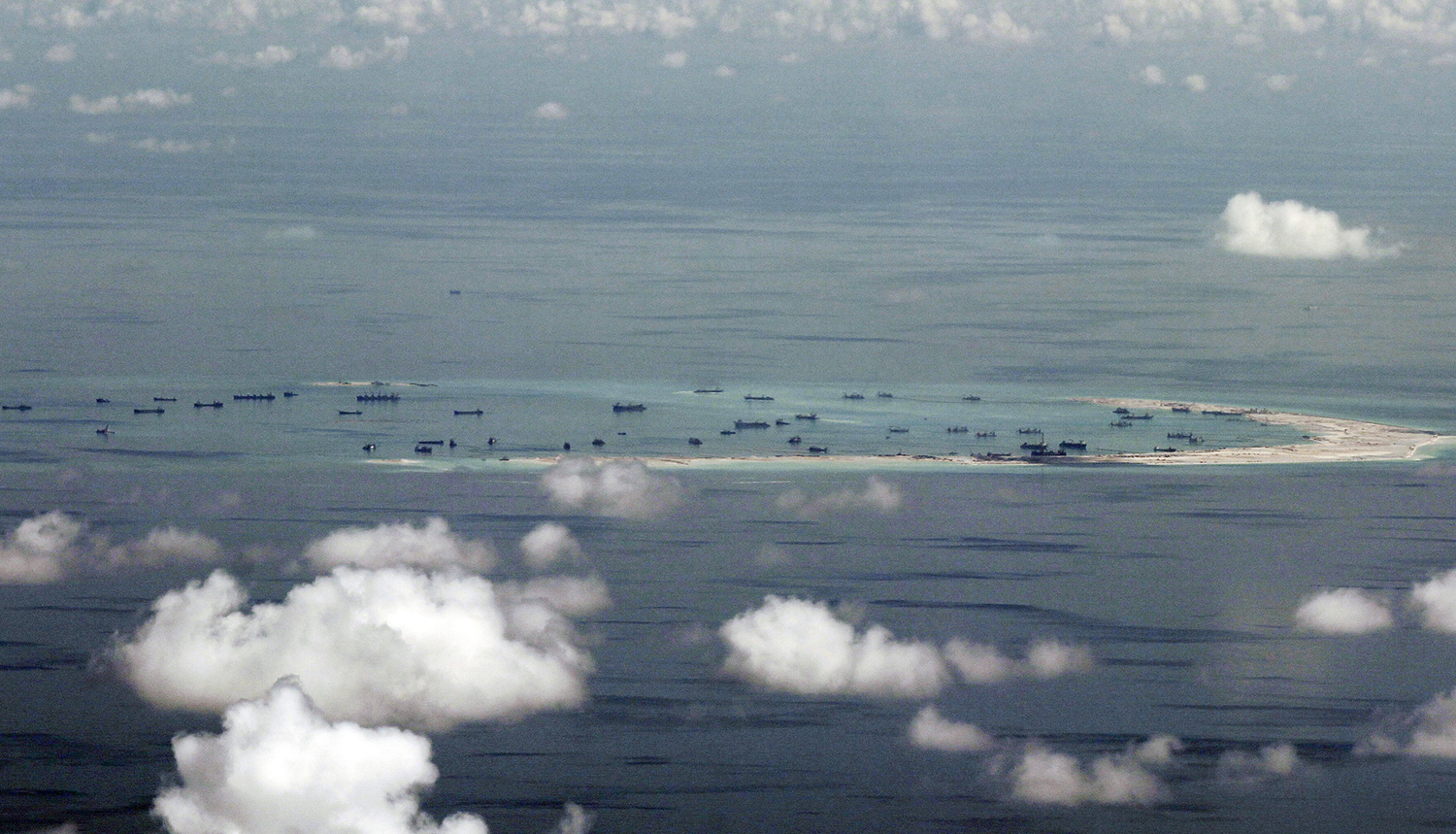Satellite images show China has built aircraft hangars in South China Sea