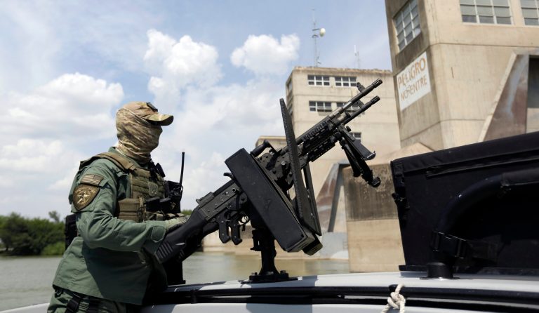 Texas Department of Safety Troopers patrol on the Rio Grand along the U.S.-Mexico border, Thursday in Mission, Texas. (AP/Eric Gay)