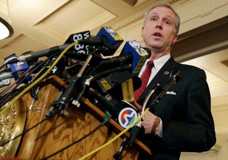 New Jersey Assemblyman John S. Wisniewski answers questions at the Statehouse, in Trenton, N.J., on Wednesday. (AP Photo/Mel Evans)