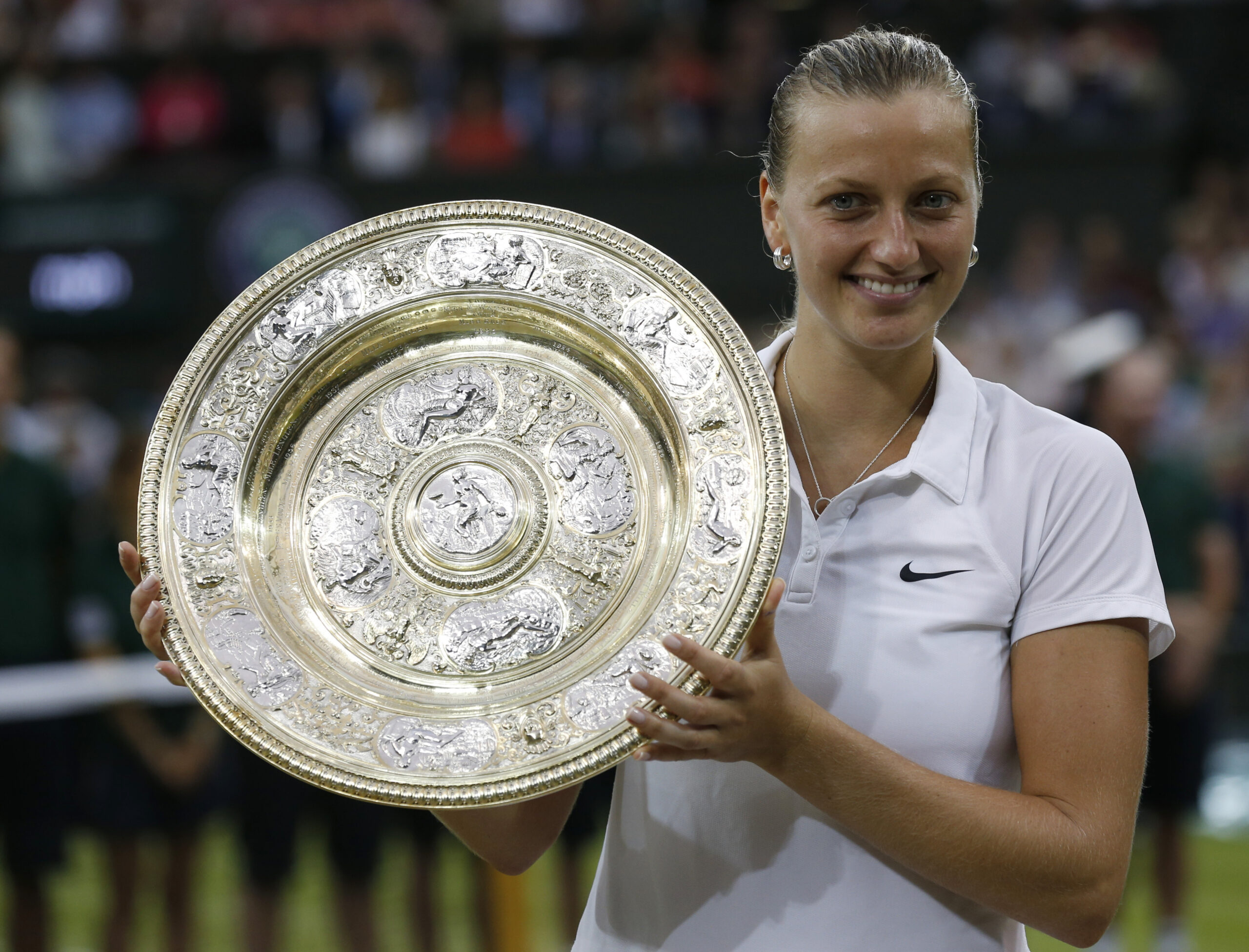 Kvitova overpowers Bouchard to win 2nd Wimbledon