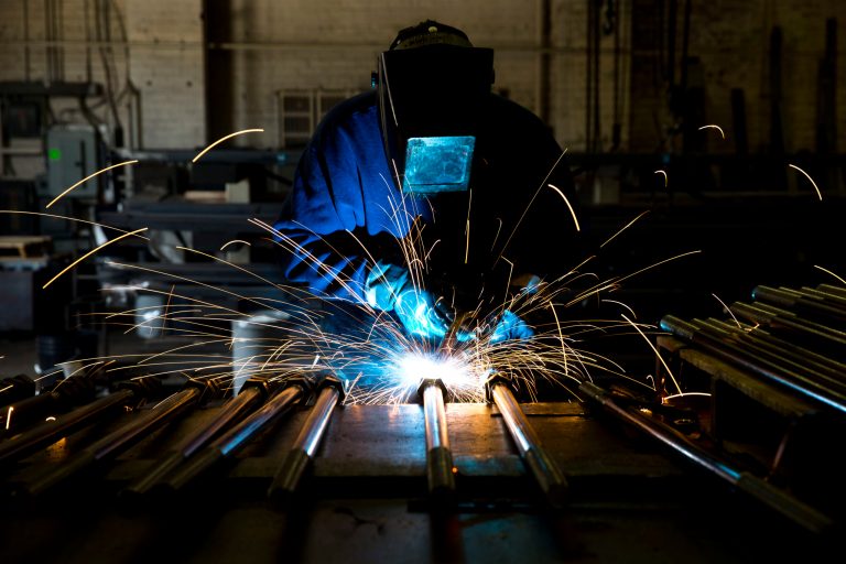 A welder fabricates anchor bolts for roads and bridges at the custom manufacturer Fox Company Inc. in Philadelphia. (AP/Matt Rourke)
