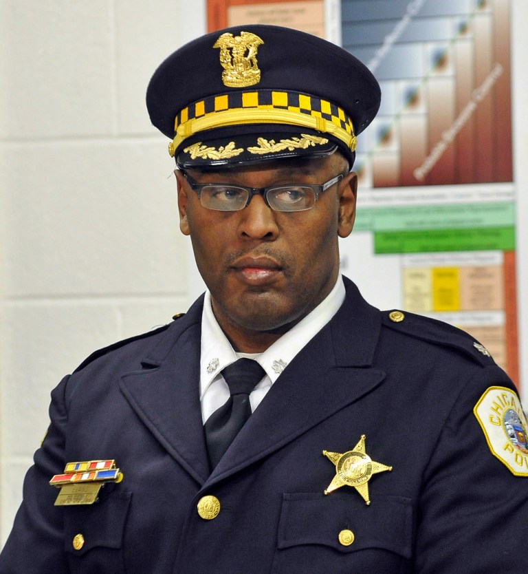 This Jan. 8, 2013 photo shows Chicago Police Commander Glenn Evans at a CAPS program event in Chicago. Evans has been stripped of his police powers after being charged with aggravated battery and official misconduct. The Cook County state's attorney's office said Wednesday, Aug. 27, 2014, the charges against Evans are the result of a complaint filed in January 2013 that alleges Evans put the barrel of his gun into a suspect's mouth following a chase. He has a court appearance scheduled Thursday, Aug. 28. (AP Photo/Sun-Times Media, Brian Jackson)  MANDATORY CREDIT, MAGS OUT, NO SALES
